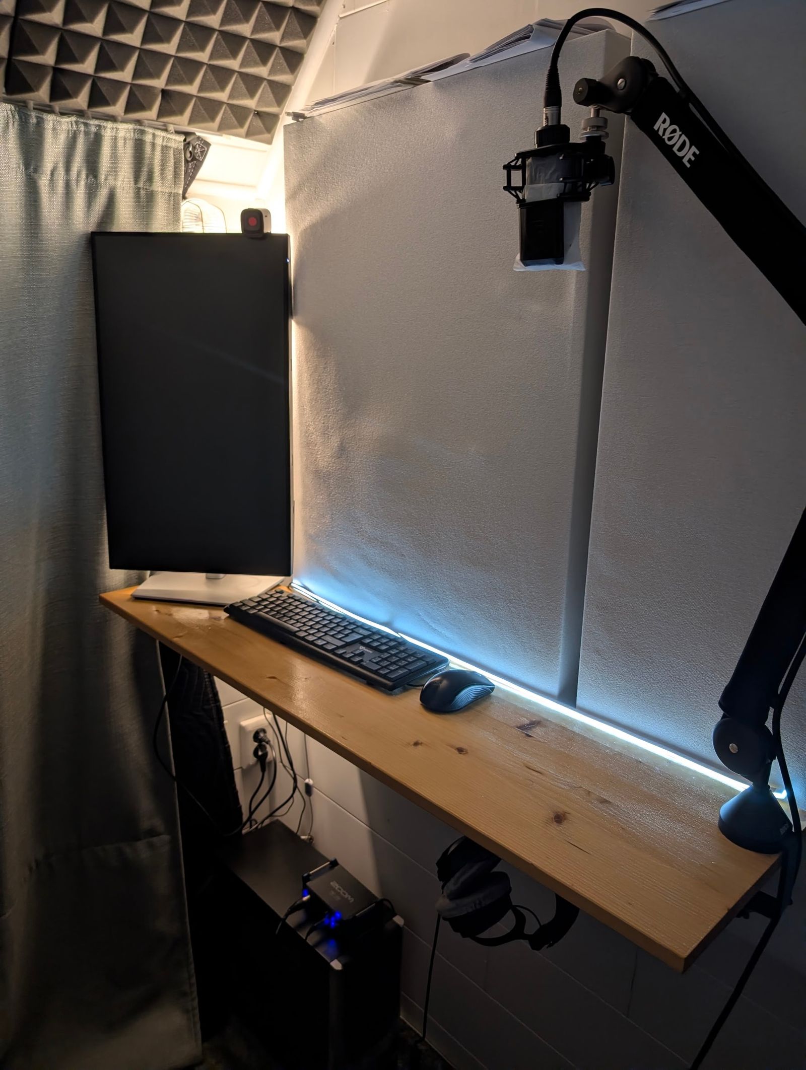 The recording position, with broadband absorber panels on the walls behind it.